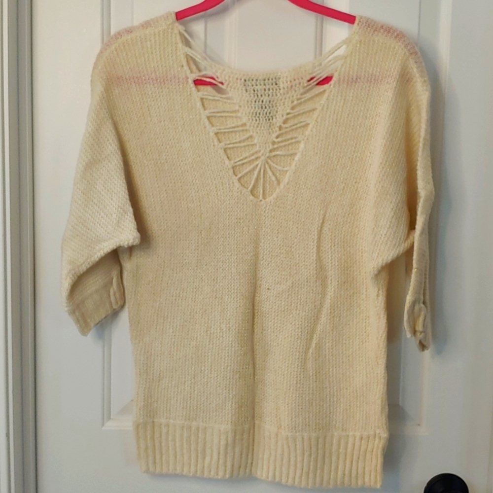 Cream colored sweater with gold threading